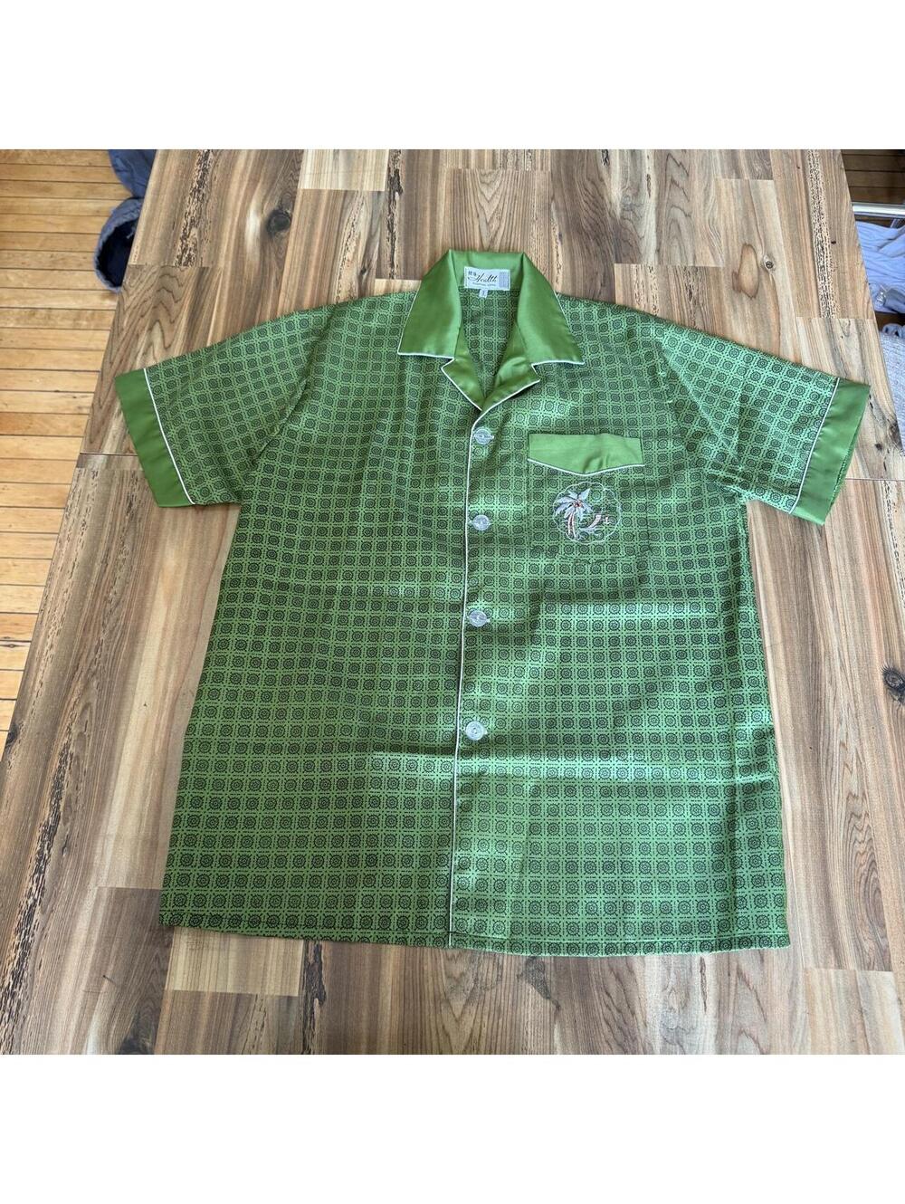 90s Green silk pajama top with repeating geometric pattern,